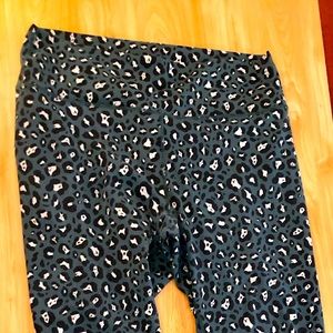 Fabletics power hold leggings size L, green leopard spot type print.